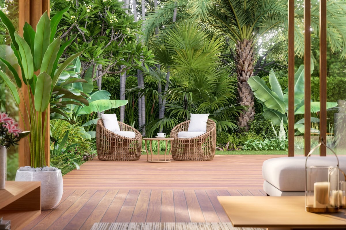 Modern wooden balcony overlooking lush tropical garden