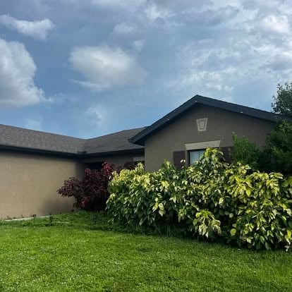 Modern house with manicured lawn and professional landscaping